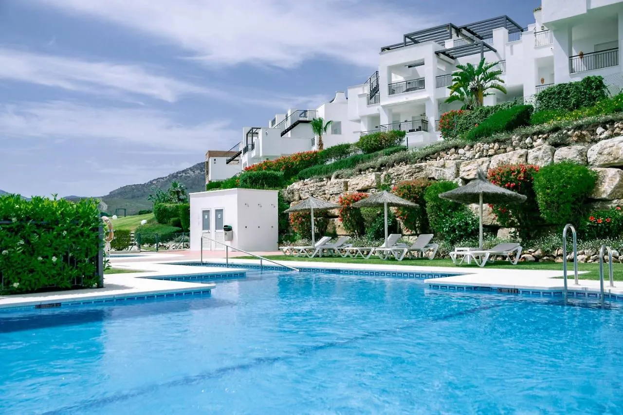 Tropical Apartment In Los Arqueros With Mountain Views And Private Garden Benahavis Spain